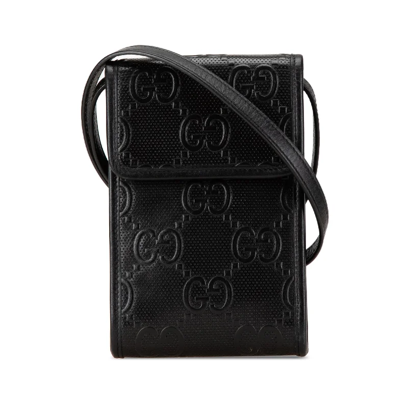 Black Gucci GG Embossed Flap Crossbody