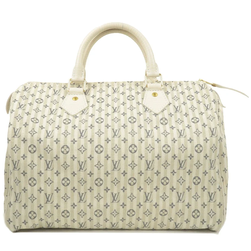 Louis Vuitton Monogram Mini Lin Speedy 30 Hand Bag M95500